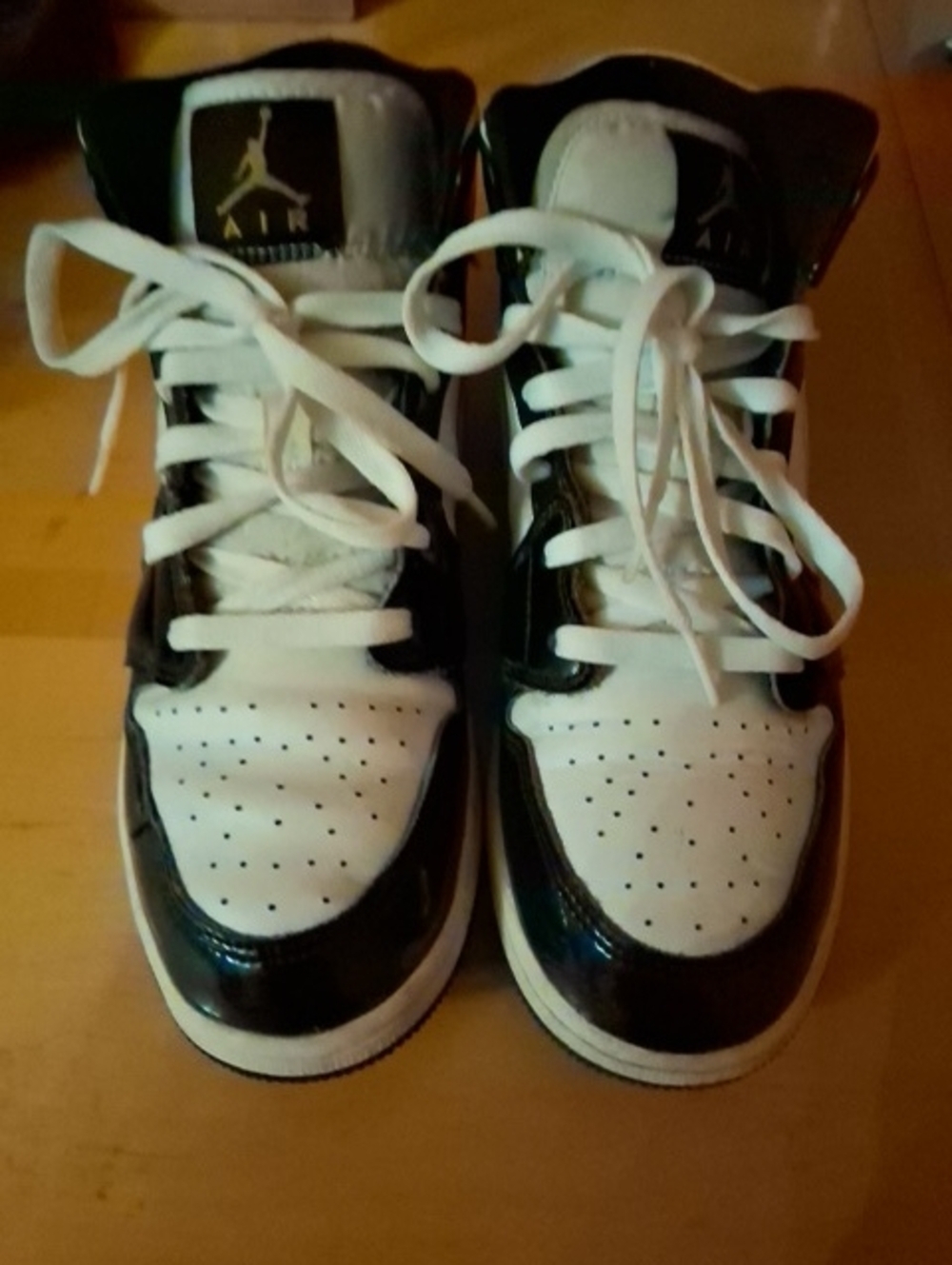 Jordan 1 Mid Kids Black and White High-Top Sneakers